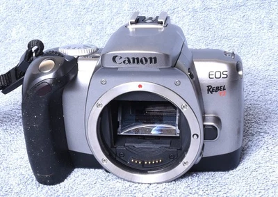 Canon EOS REBEL T2 35MM SLR Film Camera Body Silver For Parts or Repair Untested - Image 1 of 4