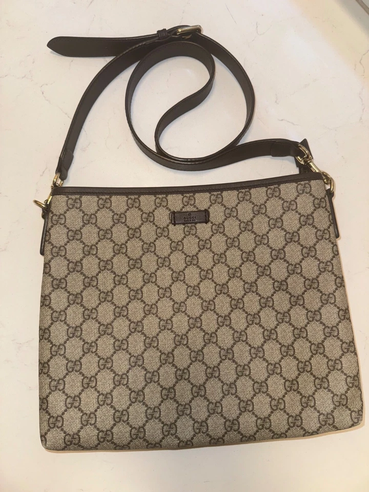 Gucci - medium cross body. GG coated canvas with leather strap. GREAT CONDITION - Image 1 of 1