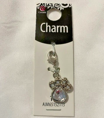 Llavero marca primo pata estrás transparente con estampado de pata Foto 1 de 3