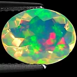 1.53 Ct Natural Ethiopian Faceted Opal Gemstone Multi Color Oval Cut - Picture 1 of 2