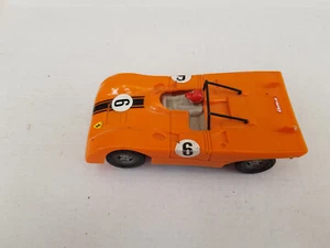 Carrera Universal: coche de carreras Porsche naranja, número 6, función no comprobada - Imagen 1 de 5