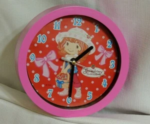 NIB  PINK  STRAWBERRY SHORTCAKE~WALL CLOCK 6 1/2" REQUIRES 1-AA BATERRY, NOT INC - Picture 1 of 3