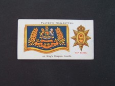 John Player's Drum Banners & Cap Badges (1924) - # 4 1st Kings Dragoon Guards