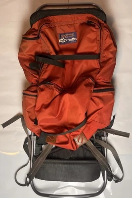 Mochila con marco de senderismo vintage Jansport hecha en EE. UU. marco de metal rojo Foto 1 de 4