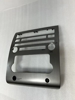 2008-2010 NISSAN TITAN CENTER DASH RADIO AC CLIMATE TRIM BEZEL W/ AUX IN OEM - Image 1 of 4