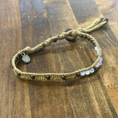 "Pulsera de acordes bronceados/translúcidos con cuentas de bronce y luna de 10,5""" Foto 1 de 4