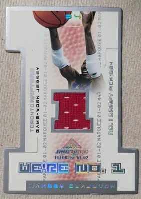 2001-02 Fleer Marquee We're No 1 Memorabilia Hakeem Olajuwon HOF - Image 1 of 2