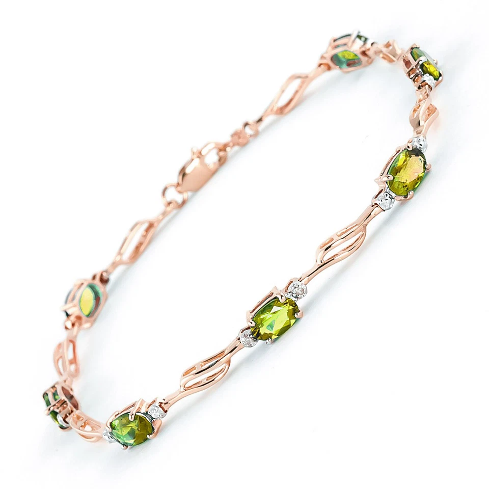 14K. SOLID GOLD TENNIS BRACELET WITH PERIDOT & DIAMOND - Image 1 of 4