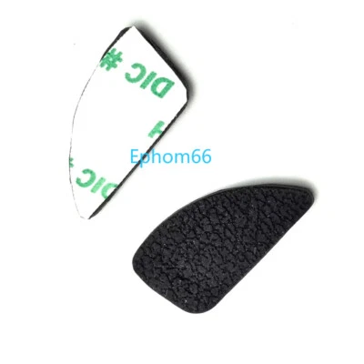 Nueva unidad de goma cubierta trasera pulgar para cámara Nikon D3200 con cinta adhesiva Foto 1 de 3