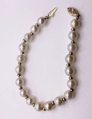 Pulseira espaçadora de ouro 14k 7 mm pérola branca 7,5" - Imagem 1 de 4