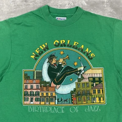 Camiseta vintage 1983 NUEVA ORLEANS LUGAR DE NACIMIENTO DE JAZZ Hanes L luna verde años 80 Foto 1 de 4