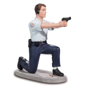 Französischer Polizist kniet mit Pistole - Picture 1 of 1