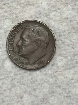 Centavo 1965 error sin revestimiento sin marca de ceca Foto 1 de 4