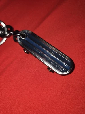 Coach Skateboard Keychain - Imagem 1 de 3