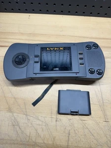 Atari Lynx PAG-0201 Handheld Video Game Console Only FOR PARTS OR REPAIR - Picture 1 of 3