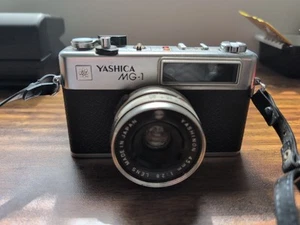 Cámara fotográfica Yashica MG-1 telémetro 35 mm con lente de 45 mm sin probar - Imagen 1 de 7