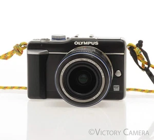 Olympus E-PL1 12.3MP Mirrorless Micro 4/3 Camera w/ 14-42mm Lens [EXC] - Picture 1 of 6