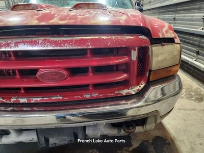 Faro izquierdo del conductor compuesto para camioneta Ford F450SD 99-00 1299424 Foto 1 de 4