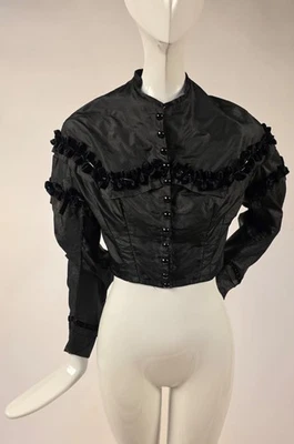 GUERRA CIVIL AÑOS 1860 CORPIÑO DE TAFETÁN DE SEDA NEGRO CON RIBETE DE TERCIOPELO DE SEDA Foto 1 de 4