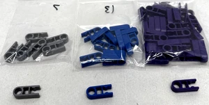 54 K’NEX Mix Color Purple, Gray, & Blue 1 Way To Shaft Connectors Lot - Picture 1 of 4