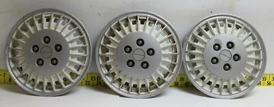 Juego de 3 tapacubos blancos 22535802 1985-89 Pontiac Grand Am (3305) OEM GM usados Foto 1 de 4
