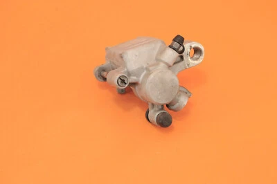 Conjunto de pinza de freno trasera genuina 1999 97-02 KX250 KX 250 43041-1687 Foto 1 de 4