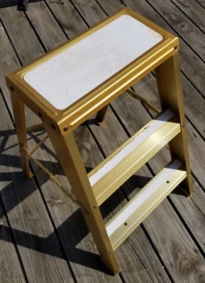 1960's Gold Colored Aluminum Folding Step Stool Ladder 25" tall x 17 " wide - Image 1 of 4
