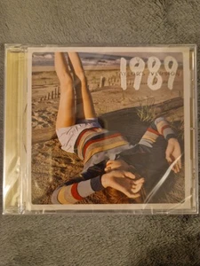 TAYLOR SWIFT 1989 TAYLOR'S VERSION CD DELUXE POLAROID SUNRISE BOULEVARD YELLOW - Picture 1 of 2