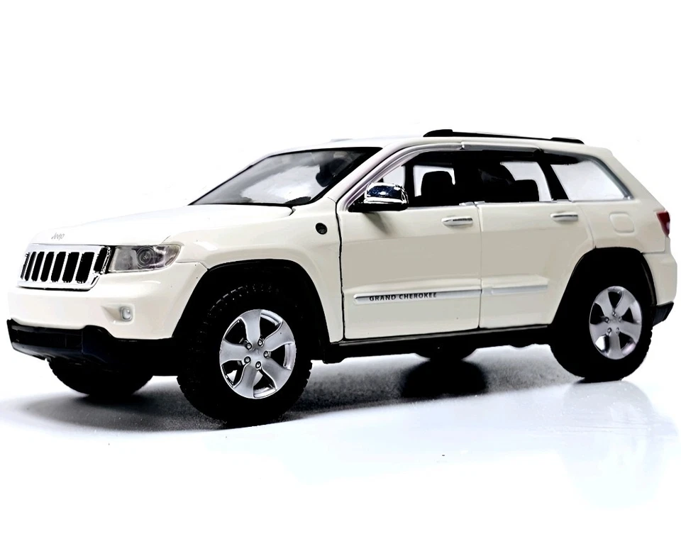Best Revelation Ever! 2011 JEEP GRAND CHEROKEE LAREDO Bone 1:24 Scale Truck - Image 1 of 4