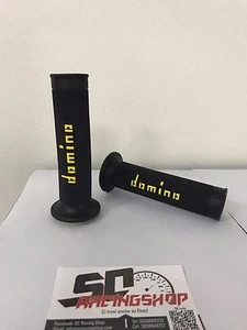 DOMINO COPPIA MANOPOLE UNIVERSALI RACING NERO-GIALLO GRIP YAMAHA YZF R6 R1 - Imagen 1 de 1