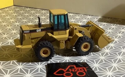 NZG CAT Kleiner Radlader in Maßstab 1:50. - Bild 1 von 4