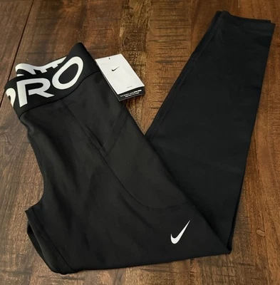 NWT Women’s Medium Nike Pro Dri-Fit High Rise 7/8 Training Leggings FV7388 Black - Image 1 of 2