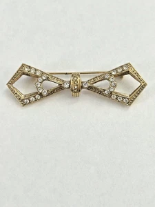 Broche prendedor barra arco marca 1928 estilo Art Deco tono dorado estrás vintage años 80 - Imagen 1 de 2