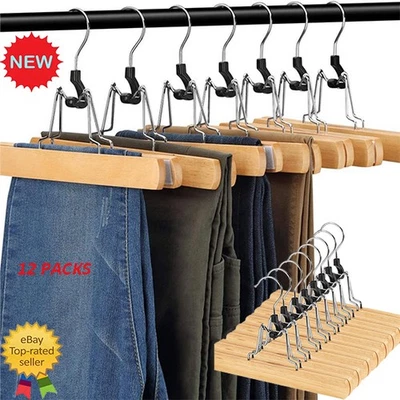 Pack de 12 perchas de madera para pantalones antideslizantes abrazadera para faldas con gancho giratorio 360°. Foto 1 de 4