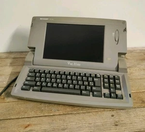 Sharp FW-750 Font Writer Personal Word Processor Vintage Floppy Vintage Macchina - Imagen 1 de 7