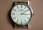 1960s Universal Geneve Men's Ultra Thin Watch W/ Linen Dial And Cabochon Crown