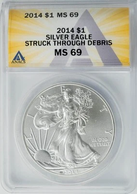 2014 American Silver Eagle $ Struck Through Debris MS69 ANACS 949979-7 - Image 1 of 4