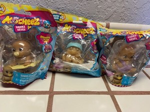 ORB Mocheez Babies Series 1 Squishy Toys-Set of 3-yellow pacifier/blue hat/blank