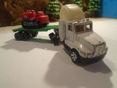 SEMIRREMOLQUE PLANO MARX ESCALA HO DE COLECCIÓN CON TOPADORA Y SEMIRREMOLQUE TYCO 1-156-1 Foto 1 de 4