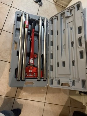 Estirador de alfombras Foto 1 de 2