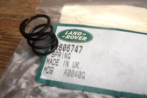 Land Rover Handbremsfeder Haltebacke. Originalteil. Teilenummer 606747 - Bild 1 von 2