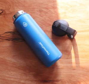 Used Battery Charged Blue ThermoFlask 240z (700mL) + ThermoFlask Black Lid - Picture 1 of 4