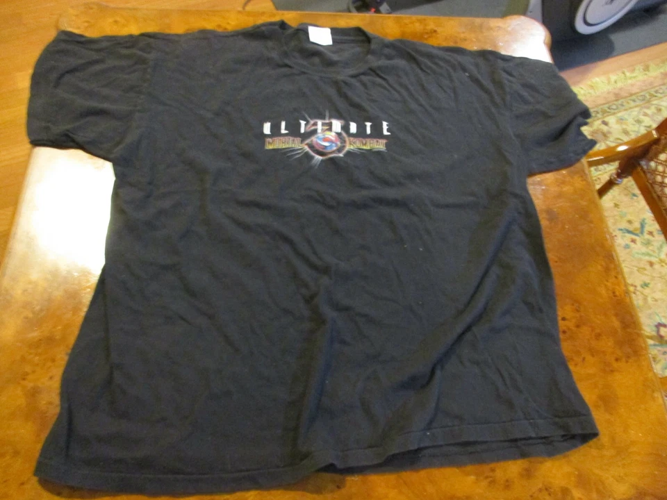 Camiseta Promo Mortal Kombat Trilogy N64 PS2 / Ultimate Mortal Kombat 3 SNES Sega Foto 1 de 4
