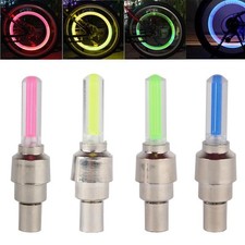 1 or 2 VALVE DUST CAP TYRE COLOUR LED NEON CAR BIKE WHEEL LIGHTS SAFETY UK