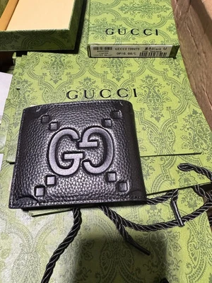 Cartera de cuero de lujo Gucci doble pliegue patrón Gucci negra edición limitada Foto 1 de 2