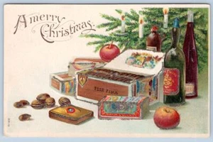 FELIZ NAVIDAD 1910 CAJA DE CIGARROS BOTELLAS DE LICOR BRILLO POSTAL EN RELIEVE - Imagen 1 de 2