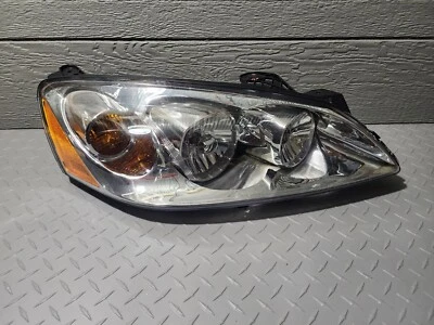 Faro pasajero derecho Pontiac G6 05 06 07 08 09 10 TYC 20-6677-00 #106 Foto 1 de 4