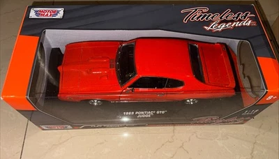 1969 Pontiac GTO Judge 1/18 Diecast Model Car Orange Metallic by Motormax - Image 1 of 4