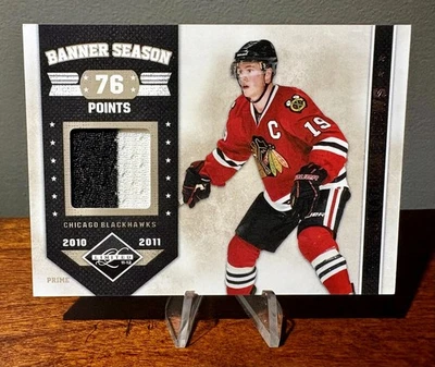 2011-12 PANINI LIMITED JONATHAN TOEWS BANNER SEASON PRIME G/W JERSEY PATCH # /50 - Image 1 of 2