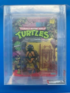 Playmates TMNT Turtles Series 1 1988 Donatello 10 dorsos AFA 85 sin perforar - Imagen 1 de 4